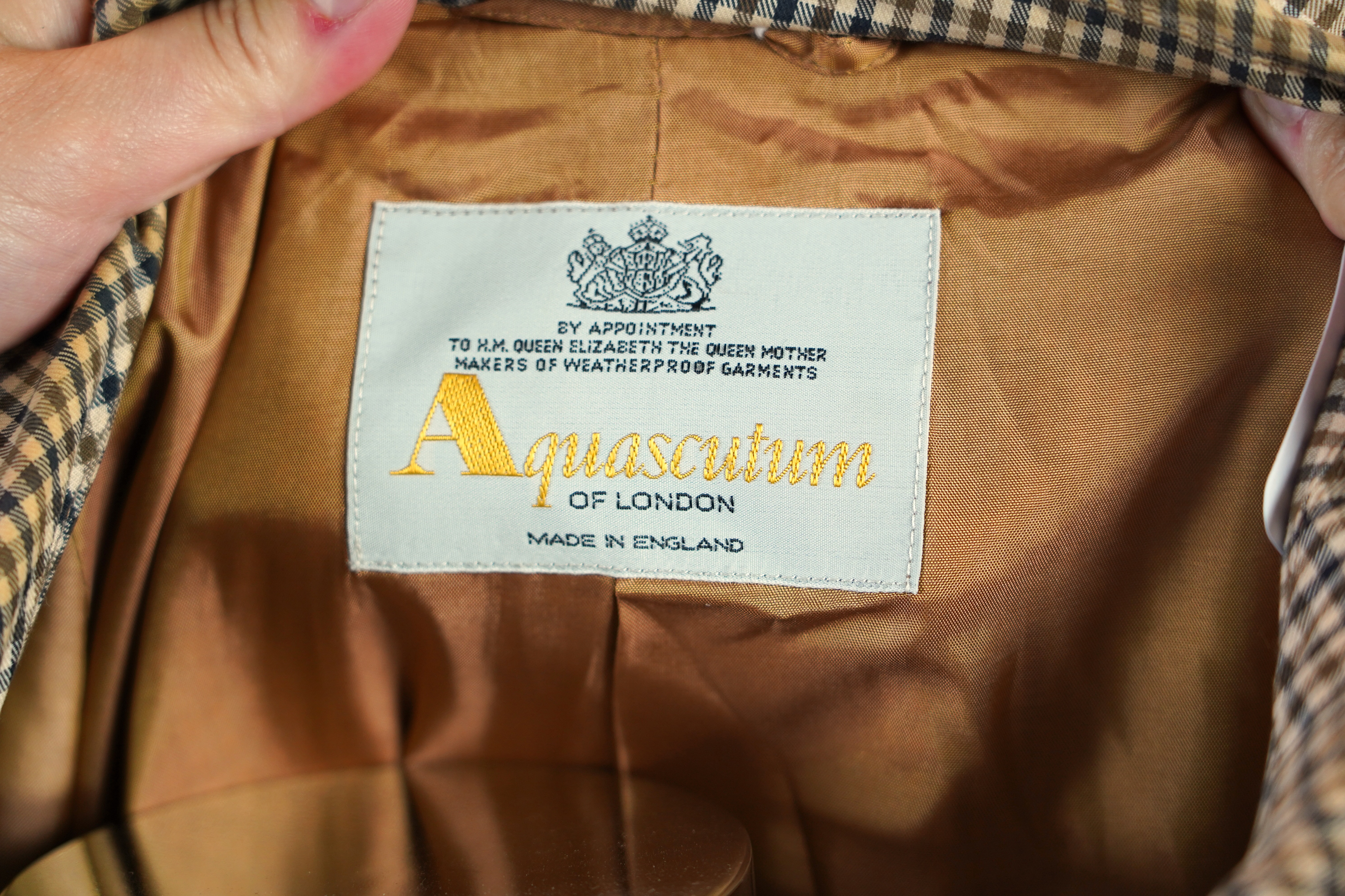 A vintage Aquascutum lady's raincoat. Approx size 12-14